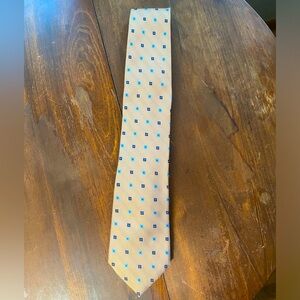 Allen Edmonds Collection necktie. Yellow with blue detail